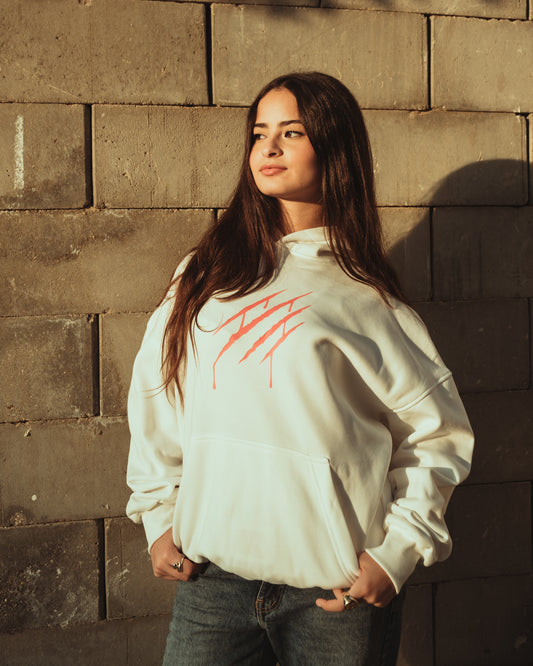 white hoodie with pink scratches