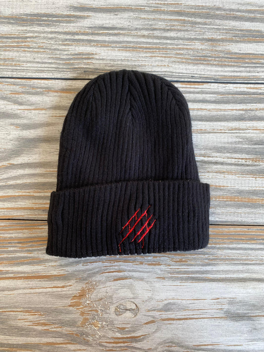 black beanie with red scratch